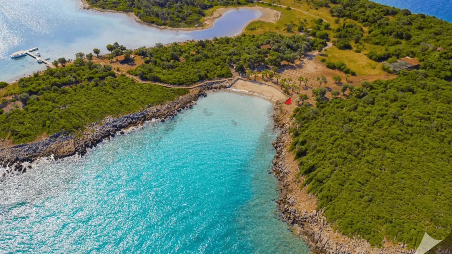 The golden sands and turquoise sea of Cleopatra Beach on Sedir Island.